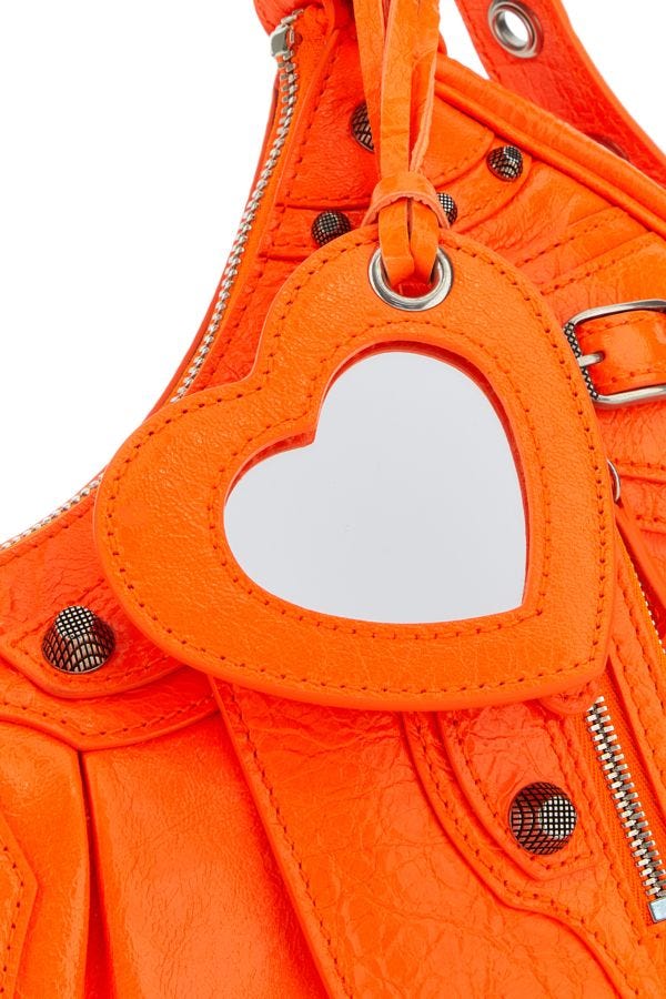 BALENCIAGA | Fluo orange nappa leather Le Cagole XS shoulder bag