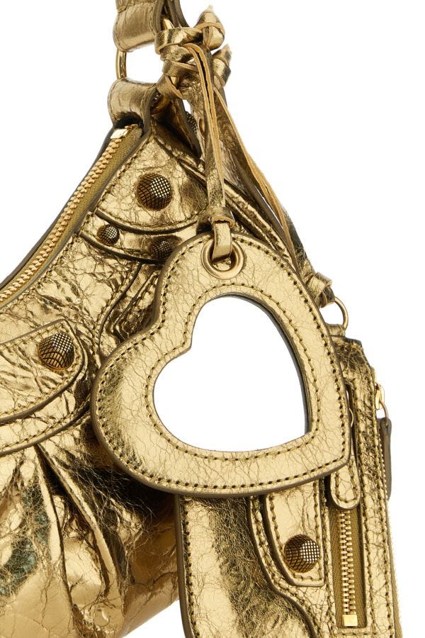 BALENCIAGA | Gold nappa leather Le Cagole XS shoulder bag