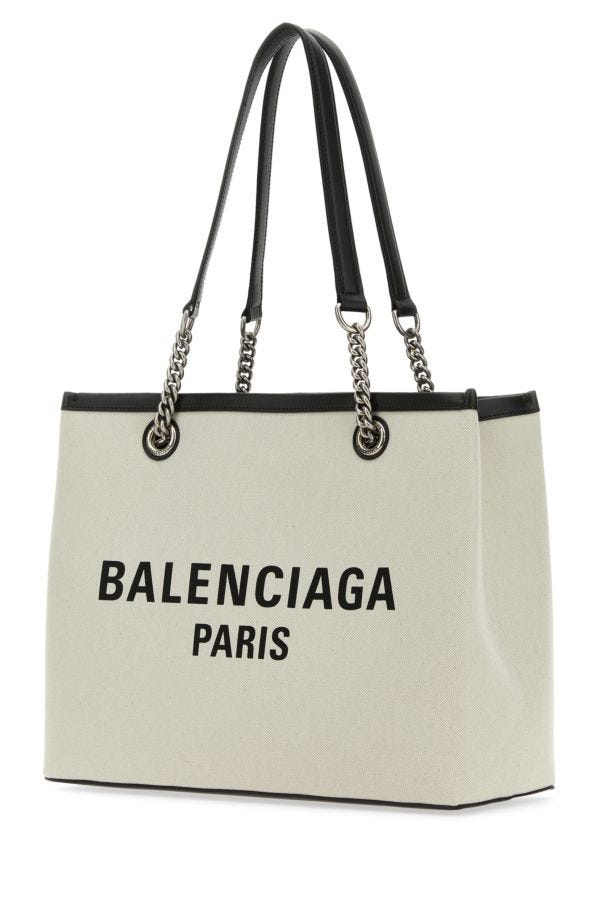 BALENCIAGA | Ivory canvas M Duty Free shopping bag