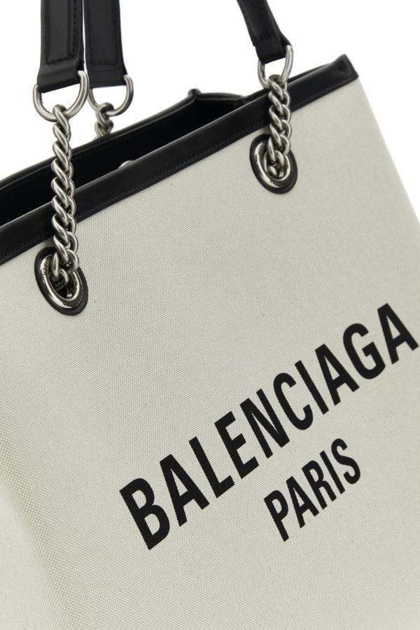 BALENCIAGA | Ivory canvas M Duty Free shopping bag