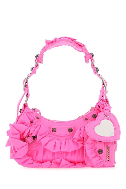 BALENCIAGA | Fluo pink fabric Le Cagole XS shoulder bag