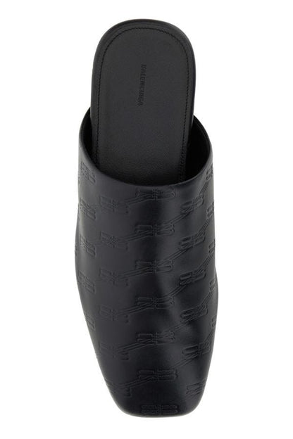 BALENCIAGA | Black leather slippers