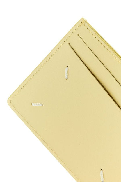 MAISON MARGIELA | Pastel yellow leather Four Stitches cardholder