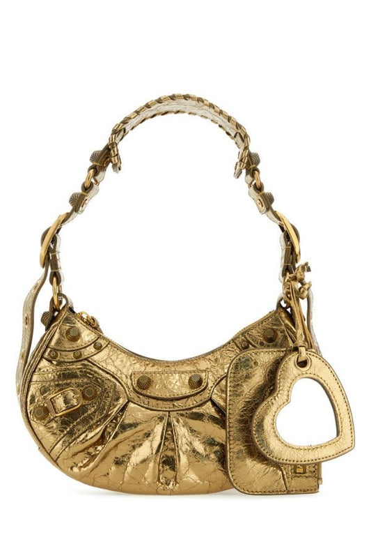 BALENCIAGA | Gold nappa leather Le Cagole XS shoulder bag