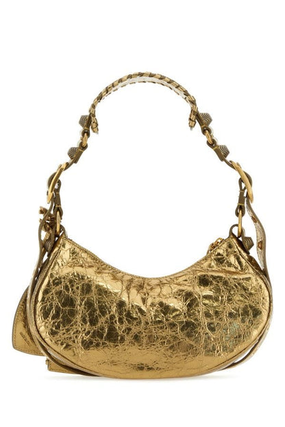BALENCIAGA | Gold nappa leather Le Cagole XS shoulder bag