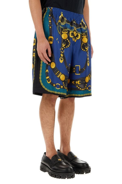 VERSACE | Printed satin bermuda shorts
