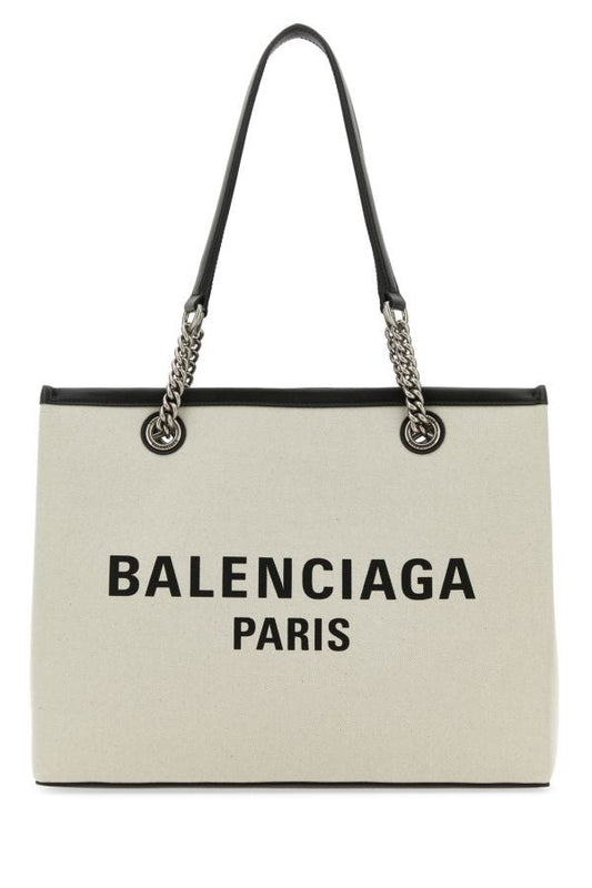 BALENCIAGA | Ivory canvas M Duty Free shopping bag