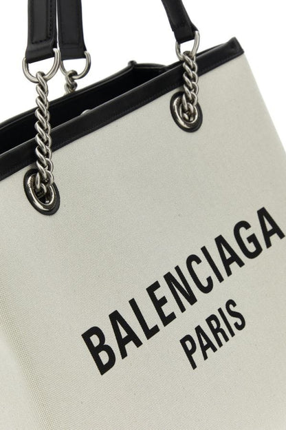 BALENCIAGA | Ivory canvas M Duty Free shopping bag