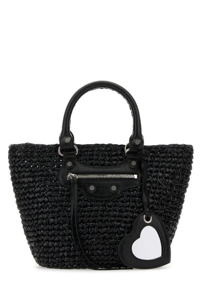 BALENCIAGA | Black raffia small Le Cagole handbag