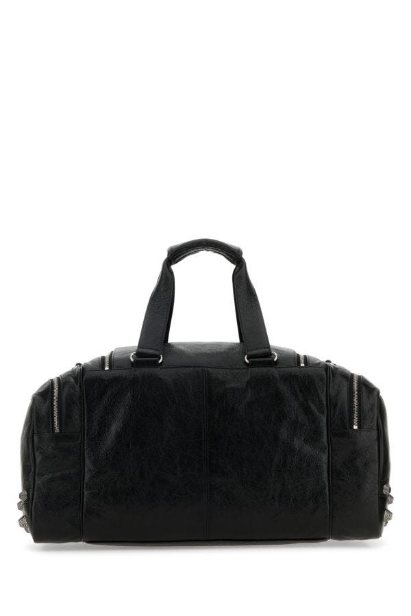 BALENCIAGA | Black leather Le Cagole travel bag
