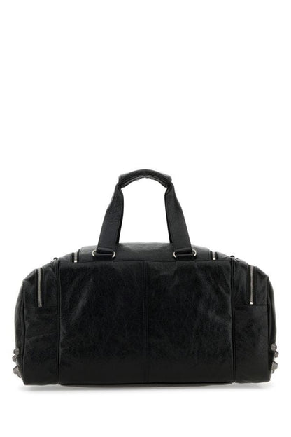 BALENCIAGA | Black leather Le Cagole travel bag