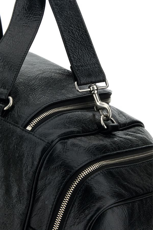 BALENCIAGA | Black leather Le Cagole travel bag