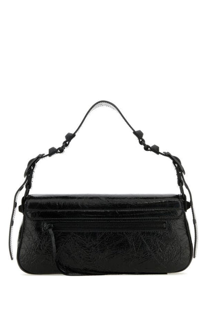 BALENCIAGA | Black leather small Le Cagole Sling shoulder bag